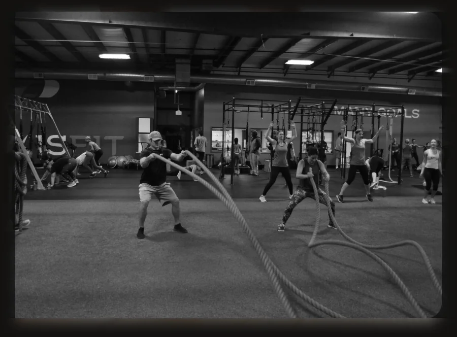 Battle ropes training inside the PraxisFit gym in Batavia